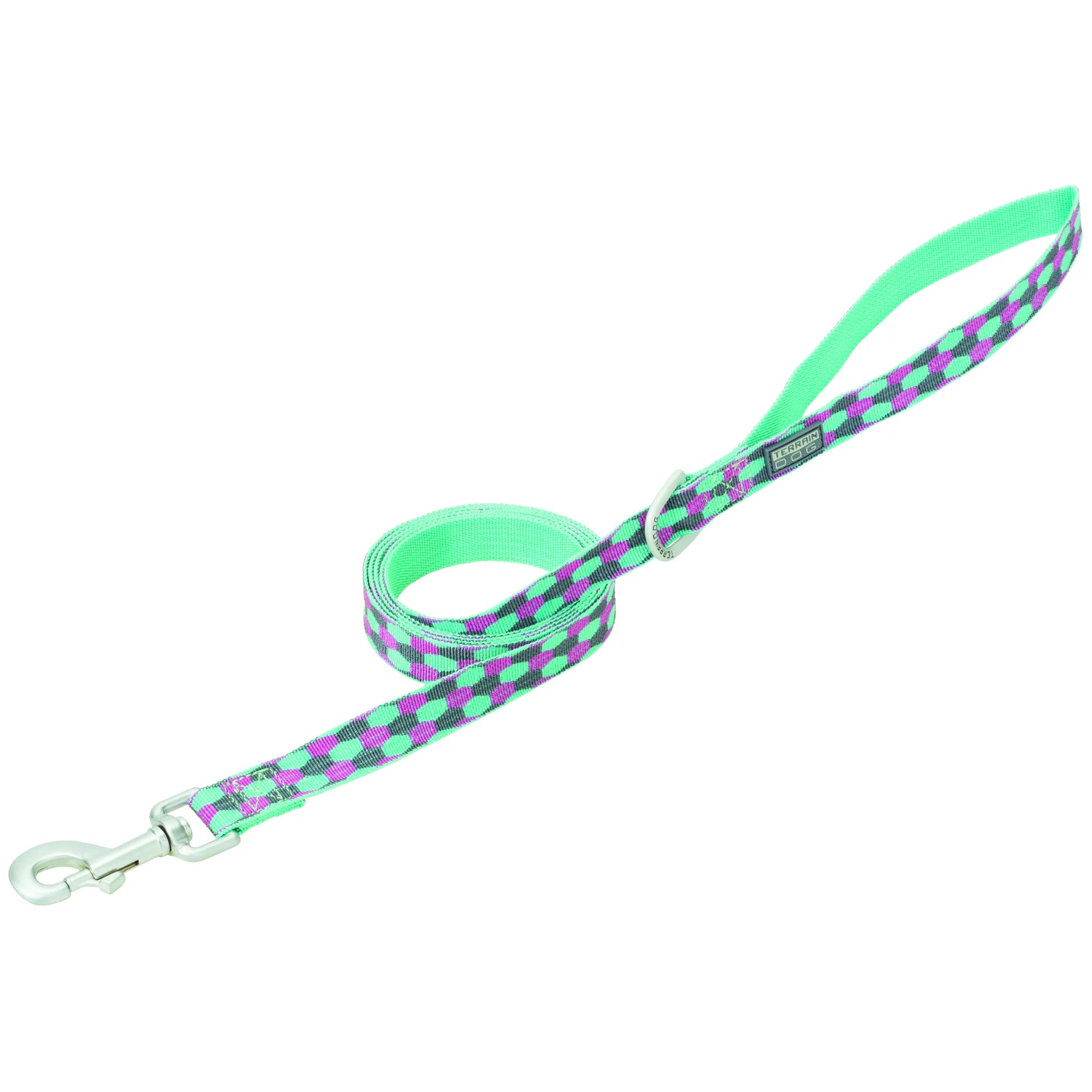 Weaver Leather Patterned Dog Leash featuring a vibrant mint green, purple, and black geometric honeycomb print. This durable nylon lead includes a secure silver swivel bolt snap hook, a comfortable loop handle, and a metal D-ring for clip-on waste bags or accessories. Stylish and functional pet gear for daily walks, labeled with the Terrain Dog brand.