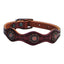 Weaver Leather Sundance Dog Collar featuring rich mahogany brown leather with distinctive scalloped edges. This western-inspired pet collar is adorned with intricate floral tooling and ornate antique copper conchos for a rustic, stylish look. Durable and high-quality, it includes a classic buckle closure and sturdy hardware, making it a premium accessory for dogs who appreciate classic artisan craftsmanship.