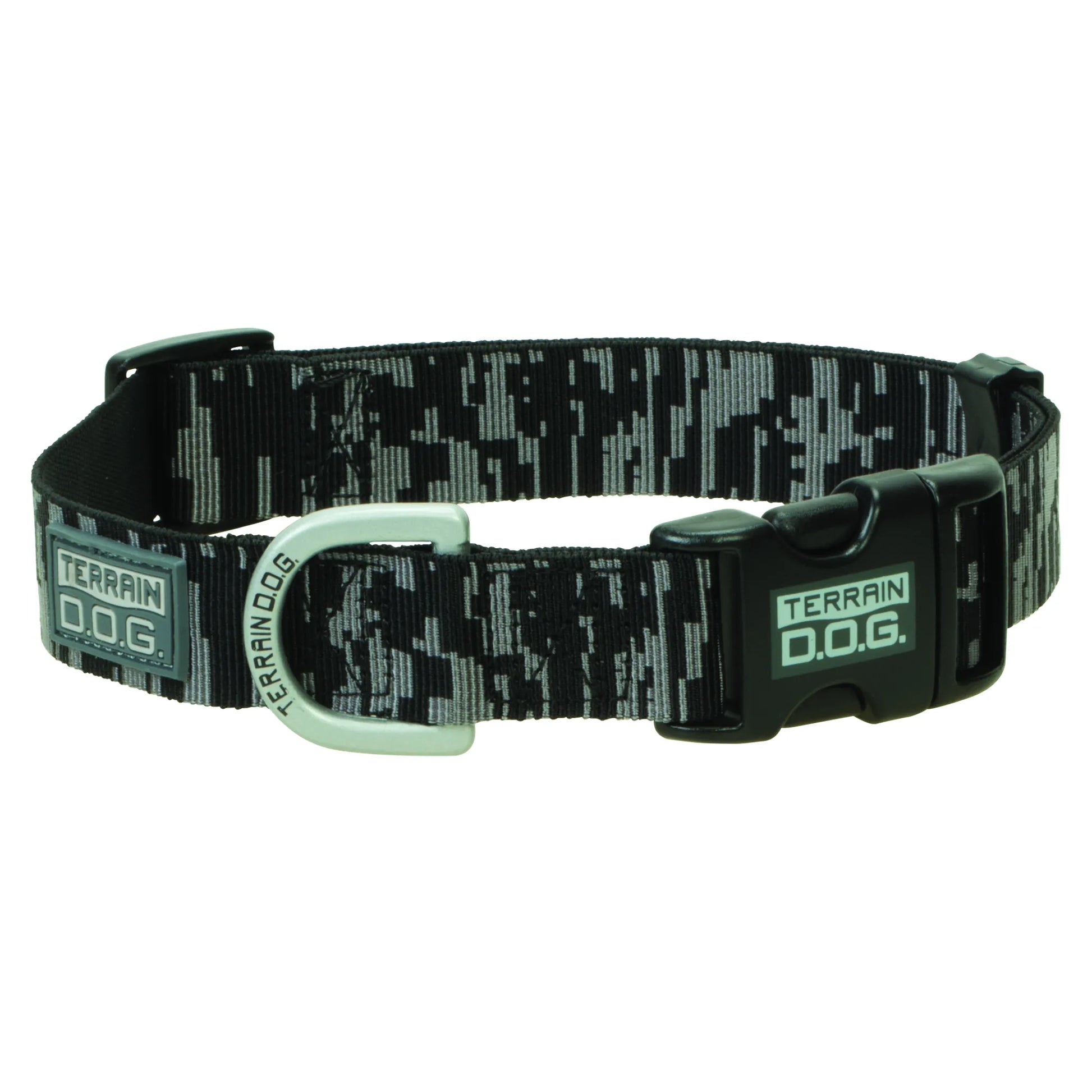Weaver Leather Terrain D.O.G. collar featuring a stylish grey and black digital camo pattern. This durable dog collar includes a heavy-duty silver D-ring, a sturdy black quick-release buckle, and an adjustable slider for a comfortable fit. Perfect for active pups, this high-performance pet gear combines rugged utility with modern style, making it ideal for hiking and everyday outdoor adventures.