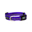 Purple Weaver Leather Terrain D.O.G. Reflective Snap-n-Go Collar featuring durable purple nylon webbing with a high-visibility reflective checkered strip. This heavy-duty dog collar includes a secure black quick-release buckle, a silver D-ring for easy leash attachment, and a rubberized brand tag. A stylish and safe choice for night walks and outdoor adventures with your active pet.