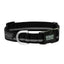 Black and grey Weaver Leather Terrain D.O.G. Reflective Snap-n-Go dog collar features a durable black nylon webbing with a high-visibility silver reflective stripe. This stylish safety collar includes a sturdy black plastic side-release buckle and a heavy-duty metal D-ring for leash attachment. Perfect for nighttime walks, it's branded with the Terrain D.O.G. logo on the buckle, D-ring, and a sleek rubber patch for an adventure-ready look.