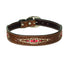 Weaver Pet Aztec dog collar crafted from high-quality brown leather with an intricate embroidered geometric pattern in cream, red, and pink. This stylish southwestern-inspired collar features durable silver hardware, a classic buckle closure, and elegant contrast stitching. Perfect for adding a touch of rustic charm to your pet's everyday look, it's a must-have accessory for dogs who love a tribal or western aesthetic.
