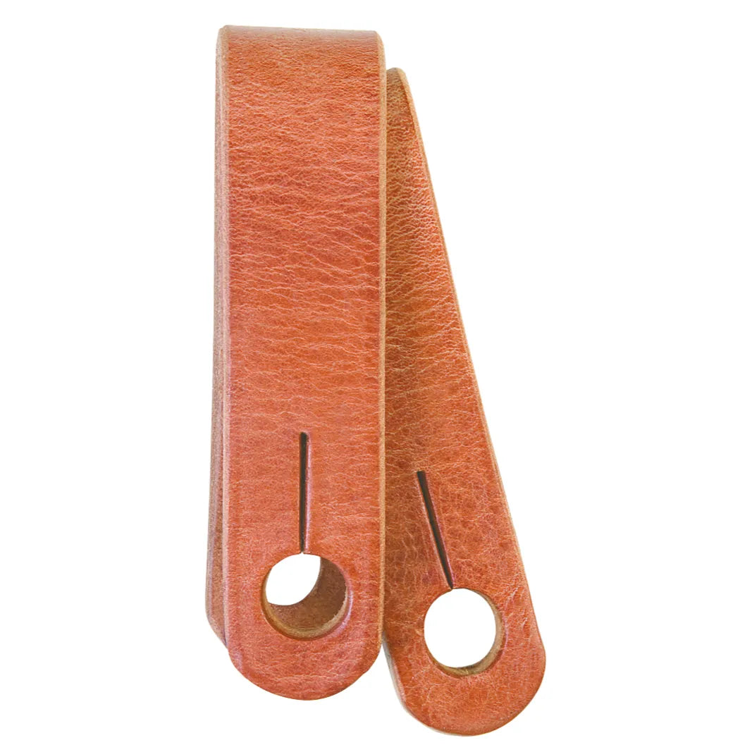 Premium Weaver Russet Leather Slobber Straps for Western horse tack. These rich, reddish-brown leather straps feature a durable grained texture and pre-cut holes with slits for secure attachment to bits and mecate reins. Designed to improve communication and signal clarity between horse and rider, these high-quality straps are essential equestrian gear for training or trail riding.
