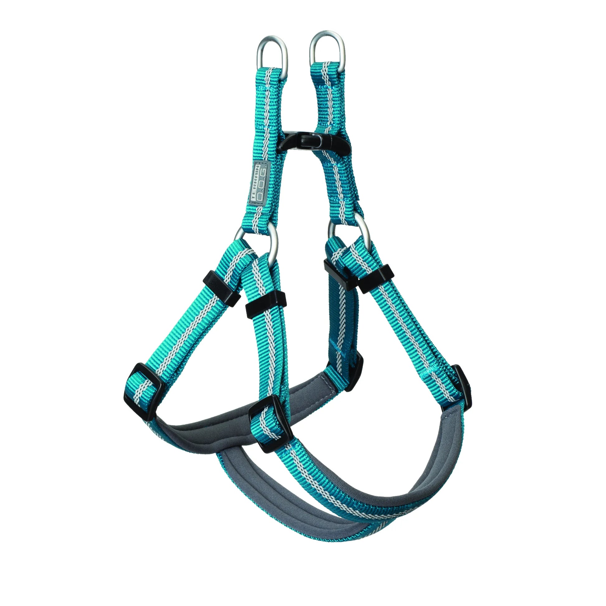 Durable Weaver Terrain D.O.G. Harness in vibrant teal with reflective silver stripes for high visibility. This adjustable dog adventure gear features gray padded lining for extra comfort, heavy-duty black buckles, and dual metal D-rings for secure leash attachment. A stylish and secure choice for hiking, training, and everyday dog walks.