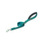 Weaver Terrain D.O.G. reflective dog leash in vibrant teal featuring two rows of grey reflective stitching for high visibility. Includes a comfortable black padded handle, a convenient D-ring for accessories, and a durable silver swivel snap hook. This heavy-duty nylon pet leash is perfect for safe nighttime walks and stylish outdoor adventures with your dog.